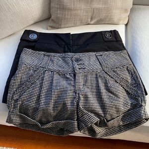 Mini black shorts and black and white shorts